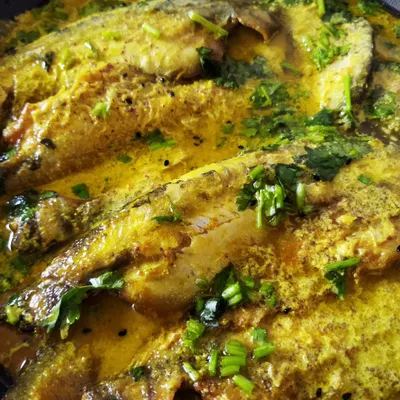 My Shorshe Pabda, where delicate butterfish is cooked in a vibrant and pungent mustard gravy. It is best enjoyed with a plate of simple steamed rice to soak up all the flavours.