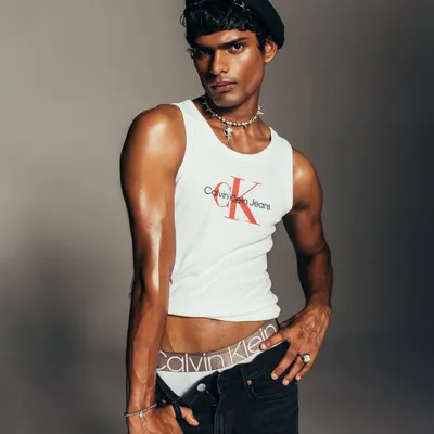 A key shot from a Calvin Klein Jeans campaign I directed. The styling is intentionally simple, using a beret to add a touch of personality while keeping the focus on the iconic logo tank and branded waistband.