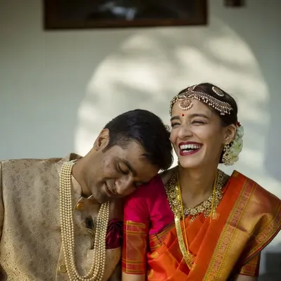 This is the essence of my "no pressure, no posing" philosophy. A groom rests his head on his bride's shoulder, and she breaks into a genuine, joyous laugh. This is real, unscripted happiness.