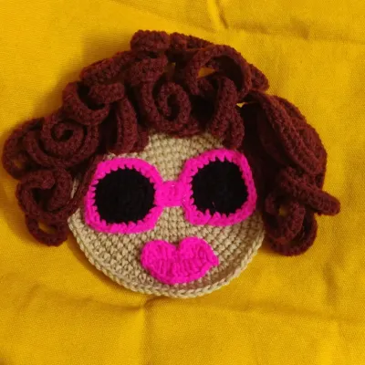 Look at this crochet diva! I designed this fun appliqué with her curly hair and cool pink shades to add personality to tote bags. These little custom details are what make a piece truly special and one-of-a-kind.