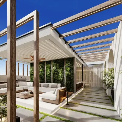 A stunning terrace design featuring a wooden pergola over a comfortable seating area. A lush vertical garden wall serves as a living art piece, while the layout provides a clear pathway and open space.