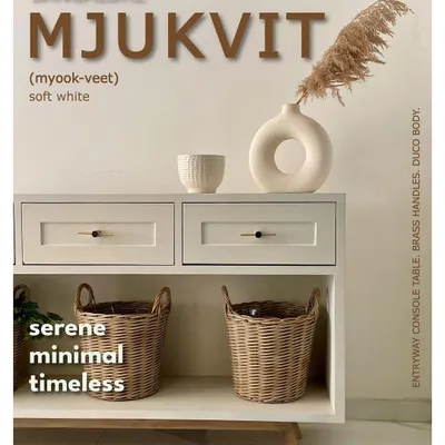 (1/3) White never looked so good. This is 'Mjukvit', a serene and timeless entryway console we designed, featuring a Duco body and brass handles.
