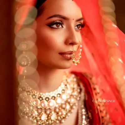 A close-up of a classic bridal look, focusing on the sharp winged eyeliner and soft shimmer on the lids. The details are what make a look truly unforgettable, from the perfectly blended skin to the precise liner.
