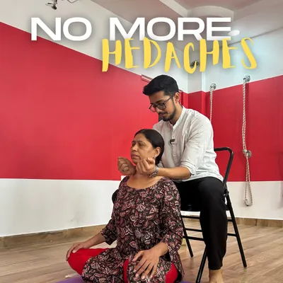 Headaches are often a direct result of tension in the neck and shoulders. In my cervical workshops, I use gentle, hands-on techniques to release this built-up stress. Here, a student finds relief through a supported neck release using a chair.