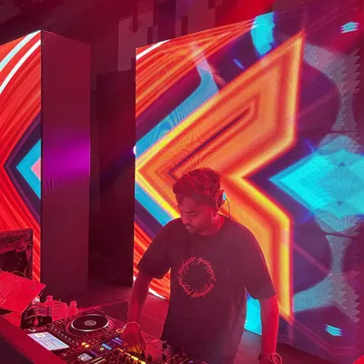 In the zone with a dynamic LED wall lighting up the stage. The right visuals are just as important as the right music for a full sensory experience.