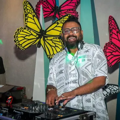 A great shot of me DJing at a private party. I love gigs like this where the theme is fun and the crowd is ready to dance all night long.