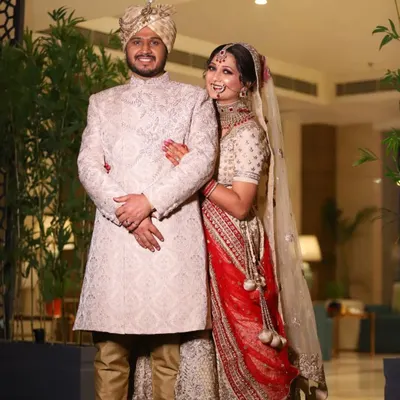 A happy and relaxed portrait of the bride and groom. I aim to capture your personalities, like this bride's joyful expression and playful pose.