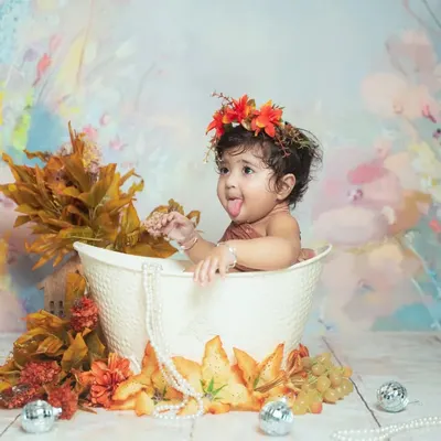 The cheeky expressions are the best part of our water splash sessions. This little one is having a blast playing in the tub.