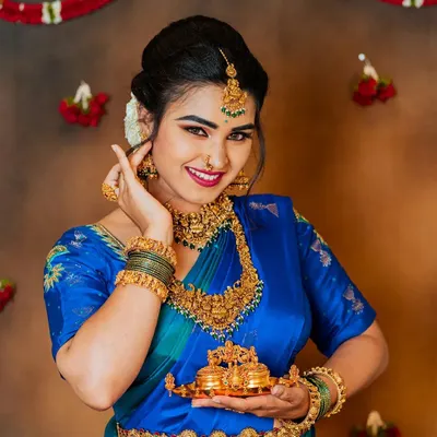 A vibrant model shoot showcasing a classic South Indian bridal look. These collaborations with makeup artists allow us to perfect our studio lighting and portrait techniques.