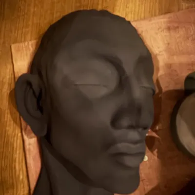 The evolution of a sculpture. This series shows a hand-built portrait bust from its raw clay form, to post-bisque firing, and finally with two different metallic glaze finishes.
