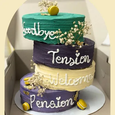 A unique four-tier topsy-turvy cake for a retirement party that reads "Goodbye Tension, Welcome Pension". This 2kg cake was a fun and memorable way to celebrate a new chapter.