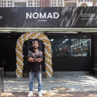 Standing proud outside Nomad Barber Mumbai. It was a dream for me to open this store, and I'm excited to offer a barbering experience like never before.