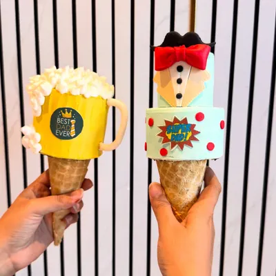 A closer look at my Father's Day 'Conesicles'. I had so much fun creating these designs, like the 'Best Dad Ever' beer mug and the quirky tuxedo cake cone, to celebrate dads in a unique way.