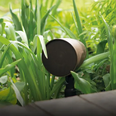This Monitor Audio CLG160 satellite speaker is designed to be a discreet part of your landscape. Tucked away amongst the foliage, it provides rich, detailed sound for your garden or patio, proving that great audio can blend naturally with the outdoors.