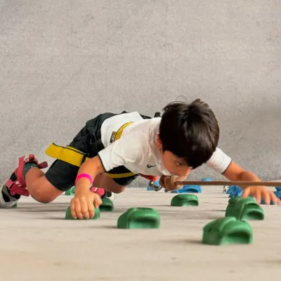 Even our youngest climbers can get horizontal! This traverse wall is a great way for kids to practice their moves close to the ground.