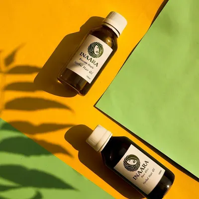 My two star players: Pure Bliss and Blossom Maple hair oils. They are packed with vitamins and micro-nutrients that act as food for your hair, helping to control hair fall, tame frizz, and reinvigorate hair tissues.