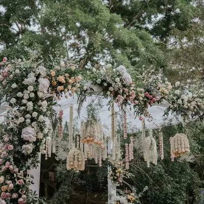 This elegant mandap is a fusion of contemporary and traditional design. We used a canopy of pastel florals and intricate hanging arrangements to create a dreamy, romantic space for the wedding ceremony.
