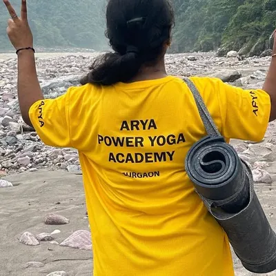 A student from our 300-hour YTTC, ready for practice on the banks of the Ganga. This journey is about embodying the yogic lifestyle.