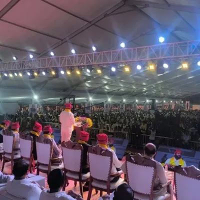 A view from the audience at the Koli Bhavan Bhumi Pujan in Airoli. This shows the stage setup and the scale of the crowd inside the massive tent I erected for the event.