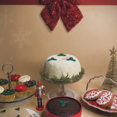 Our full Christmas menu spread. This photo captures the nostalgic and comforting spirit of our holiday offerings, from traditional fruit cake and marzipan to festive cupcakes.