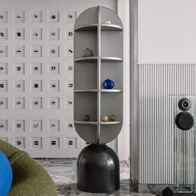 The totem display shelf at Frenchie Haus is a perfect example of our love for curious objects. It stands next to our Morse code wall, creating a corner filled with personality and stories.
