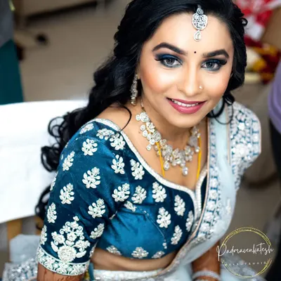 A close-up of the finished blue smokey eye look for a reception. I used high-quality pigments to ensure the color was rich and blended seamlessly, creating a captivating and glamorous effect.
