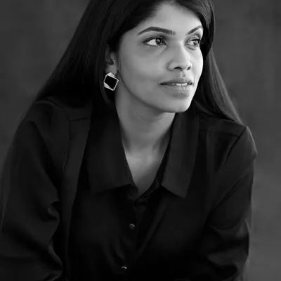 A thoughtful black and white portrait of Mahi. This classic, emotive style focuses purely on expression and is a powerful addition to any professional portfolio.