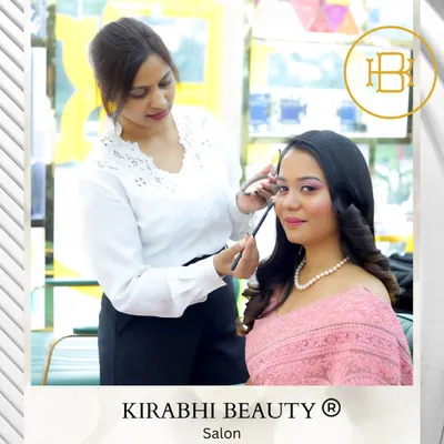 Here I am, in my element, giving a client a soft glam look. My focus is always on the details, from choosing the right eyeshadow shades to blending everything perfectly, ensuring my client looks and feels her absolute best.