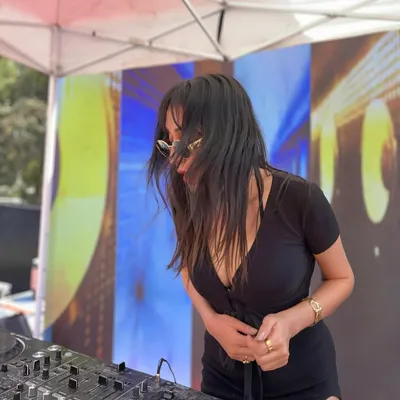 There's no place I'd rather be. A candid shot of me at a daytime gig, feeling the breeze and the music.