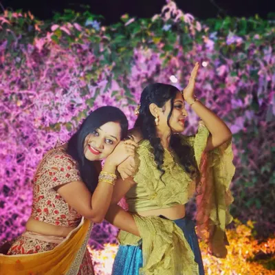 This is us, Namitha and Varshitha. We're a doctor and an engineer by profession, but dancers by passion. We started Sibling Studio to share our love for dance and create fun memories for your big day.