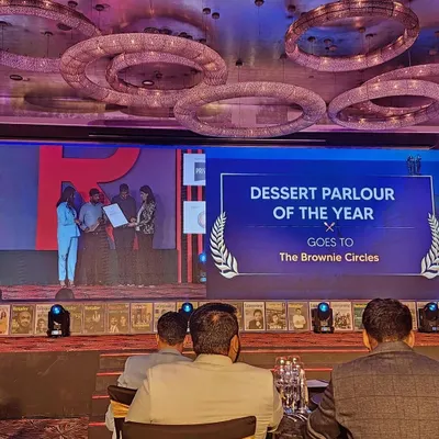 A proud moment for our team as we accept the award for "Dessert Parlour of the Year" at the Restaurant Awards 2024.