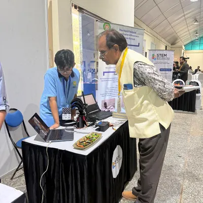 Our student Yashas Gupta explaining his award-winning project, an innovative robotic hand glove to help paralytic patients. He won the "Future Ready Solution" award at the STEM BEST PRACTICES Exhibition.