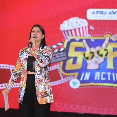 Taking center stage at the "Swag in Action" event for Apraava Energy. Dressed for the Bollywood theme, I'm ready to bring the high-energy vibe needed for a corporate celebration night.