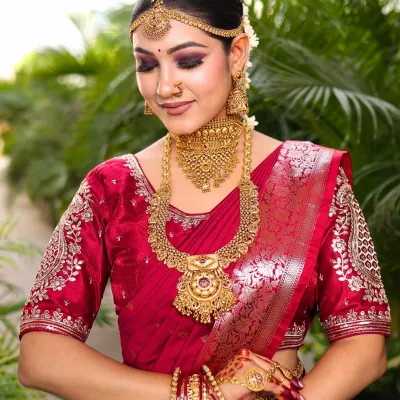 This is a classic South Indian bridal look. I focused on creating a flawless base, bold smokey eyes, and pairing it with traditional temple jewellery and a beautiful silk saree.