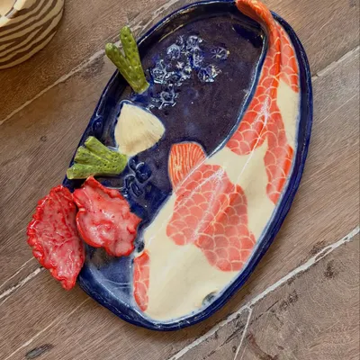 This incredible koi pond platter was made by Aarti, one of my beginner students. Her patience and attention to detail are just stunning. It’s a perfect example of how hand-building allows for such imaginative and sculptural work.