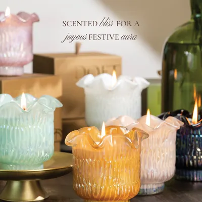 Scented bliss for a joyous festive aura. My Lotus Votive scented candles are inspired by the iridescent beauty of the lotus flower. Available in seven gorgeous colors and seven exclusive fragrances, they are perfect for creating a vibrant tablescape.