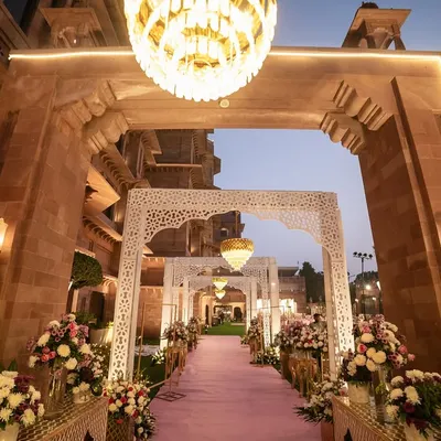 The beautifully decorated entrance to a wedding venue, setting a grand and welcoming tone for the guests. We capture the ambiance you've worked so hard to create.