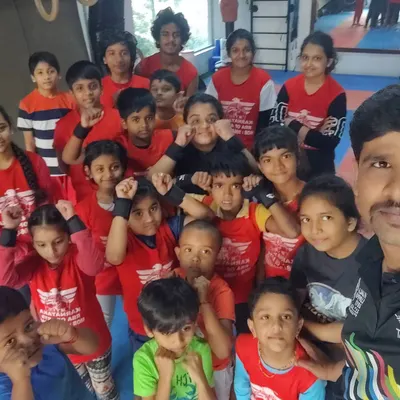 A group photo with my energetic gymnastics batch at the RR Nagar academy. It's great to see them all ready to learn and push their limits together.