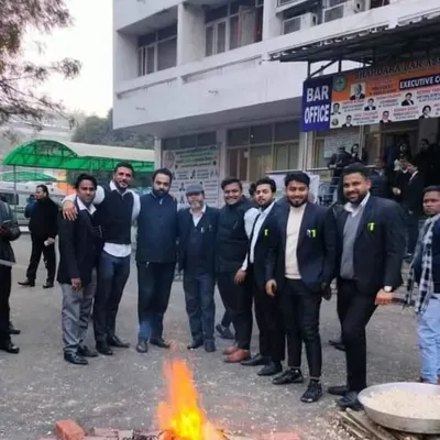 Celebrating Lohri with my fellow advocates outside the bar office. The bonfire brings warmth and a sense of community during the winter.