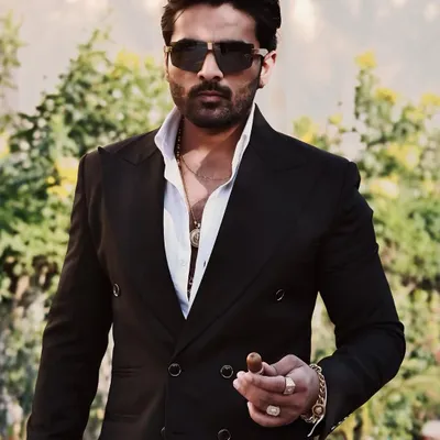 Our client Mr. Vansh looking dapper and confident in our classic black double-breasted suit.
