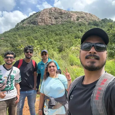A quick selfie break during our Makalidurga trek. We make sure there's plenty of time to enjoy the journey, capture memories, and appreciate the stunning scenery with your colleagues.