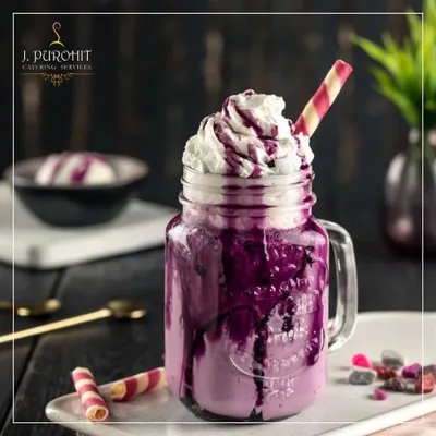 My dessert shakes are a highlight for guests of all ages. This Black Grape shake is a perfect example, blending rich fruit puree with creamy ingredients and served in a mason jar with whipped cream. It’s an indulgent treat that always gets people talking.