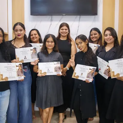A proud moment with my graduating batch of professional makeup artists. Each student holds a certificate that represents their hard work, dedication, and the start of a new career.