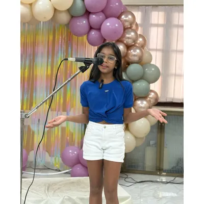 Our first-ever stand-up comedy showcase was a huge hit. This young comedian had the audience in stitches with her clever jokes and confident delivery.