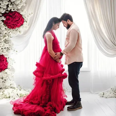 A quiet, shared moment between partners amidst a beautiful floral setup. I guide couples into poses that feel natural and highlight their bond during this special time.