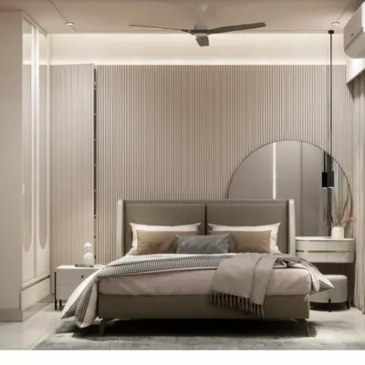 A 3D render of a master bedroom in Malad West. The design features fluted wall paneling, a large round mirror, and a neutral color palette for a calming effect.