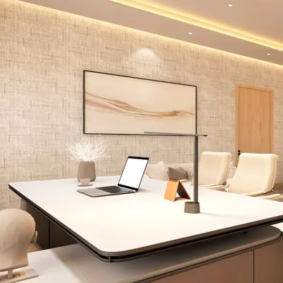 The Principal's Room at The Shri Ram Universal School, Jaipur. The design features a modern, minimalist desk, textured wallpaper, and soft, indirect lighting to create an environment that is authoritative yet comfortable.