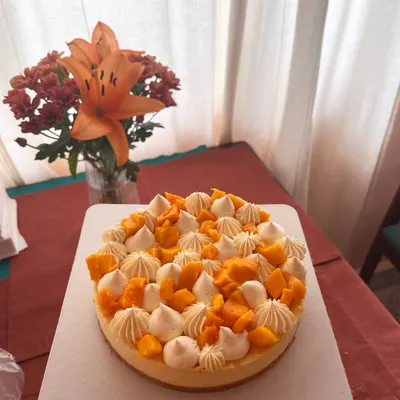 My baked mango cheesecake is a seasonal favorite. It has a creamy, rich cheesecake base on a biscuit crust, topped with fresh cream and sweet mangoes. I also offer this in an eggless version.