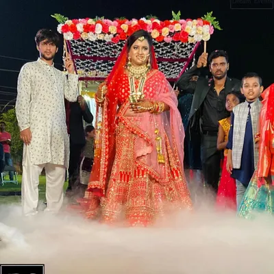 A dreamy bridal entry. I arranged for a 'phoolon ki chaadar' and a cloud of low-lying fog to make the bride's walk down the aisle feel like she was floating on air.