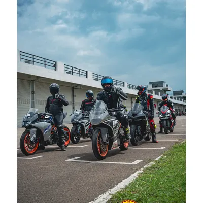 This is a classroom you'd pay attention in. Riders lined up in the pit lane, ready to head out for their session at the Madras International Circuit.